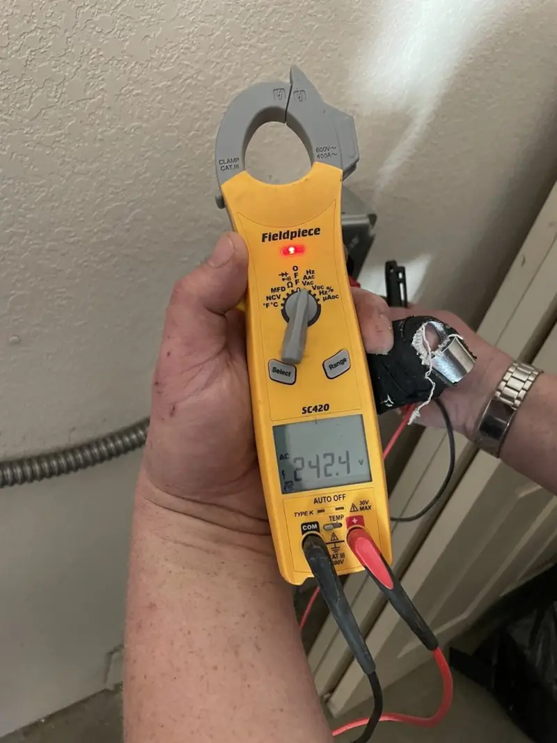 Voltage testing with clamp meter during Generator Installation in Lawrenceville